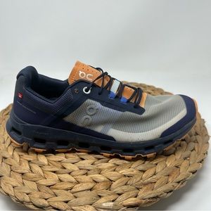 On Running Athletic Shoes in Navy and Orange